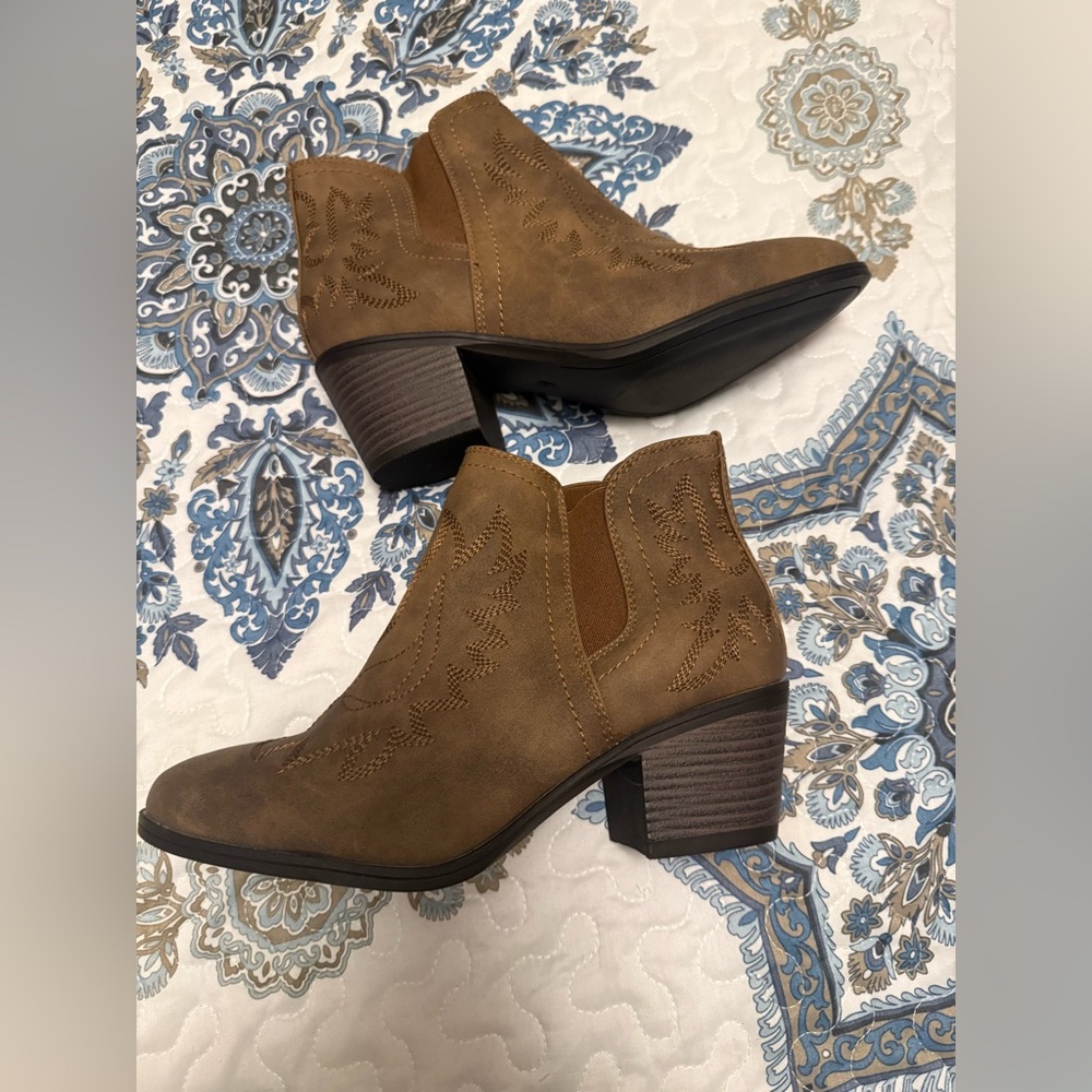 Brand new dark brown bootie. Size 6